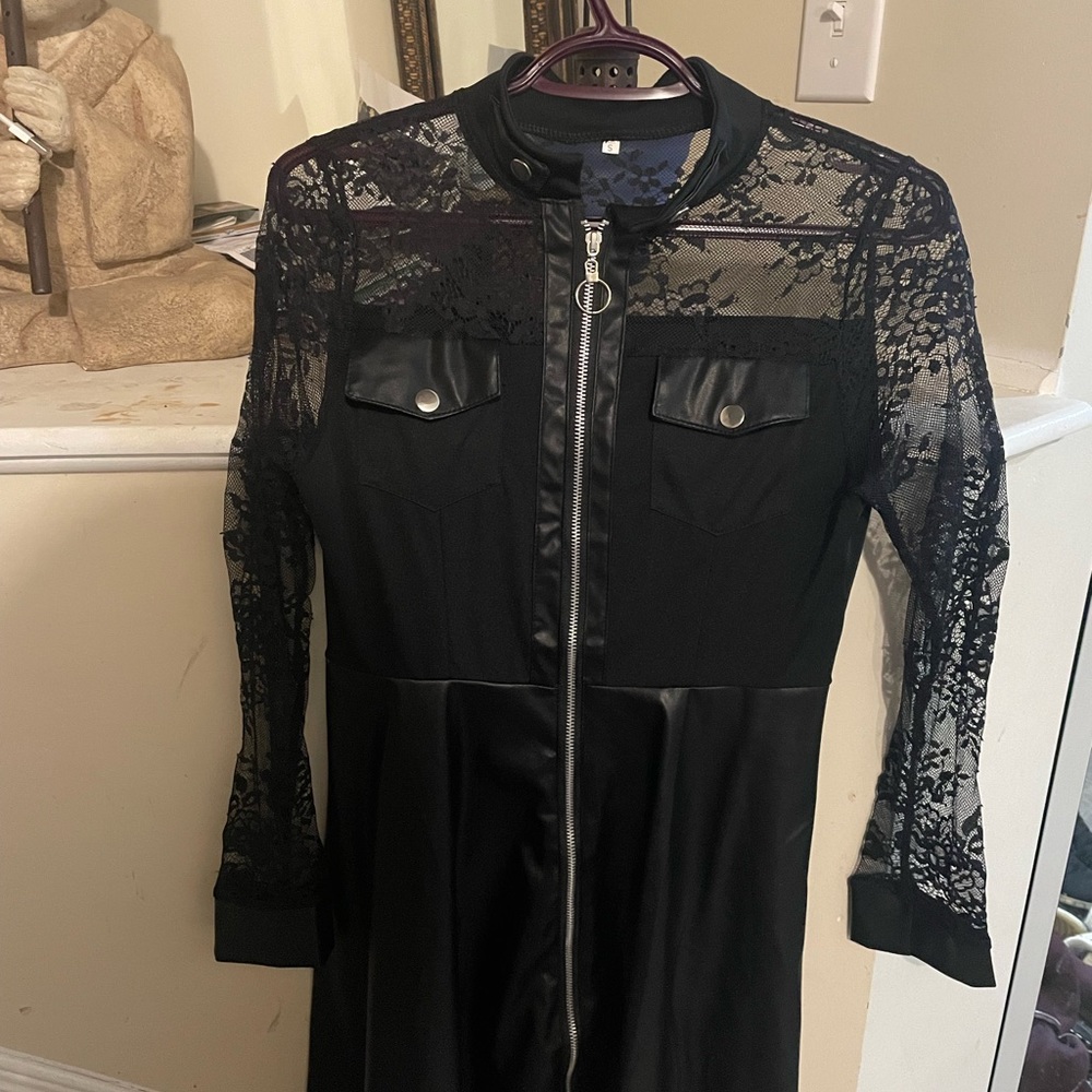 Beautiful lace and leather sexy zip down dress brand new never work without tag